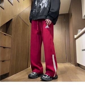 Adidas Men's Burgundy Joggers with White Stripes